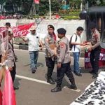 Aksi Humanis Polisi saat Hari Raya Buruh 2026 di Silang Monas Jakarta